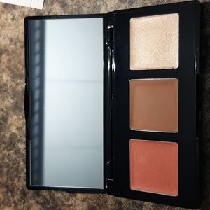 Laura Geller multitasking eye lip cheek pallette